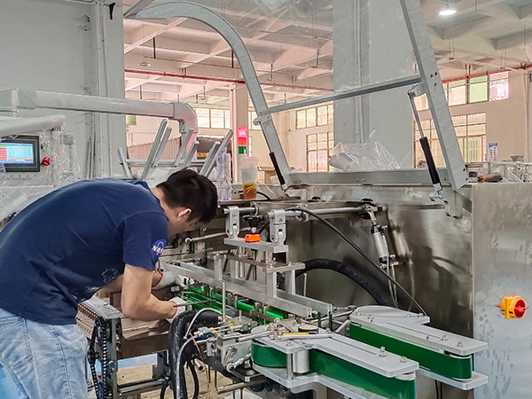 间歇式装盒机喷胶系统改造方案的确定